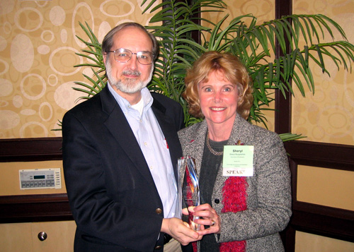 Burgstahler receives Catalyst Award from Dr. Gregg Vanderheiden, Director of the Trace Center. Picture of Dr. Gregg Vanderheiden and Sheryl Burgstahler with the award.