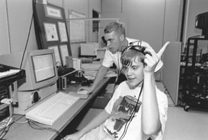 Randy explores virtual reality as a 1993 Phase I Scholar Picture of Randy with virtual reality gear