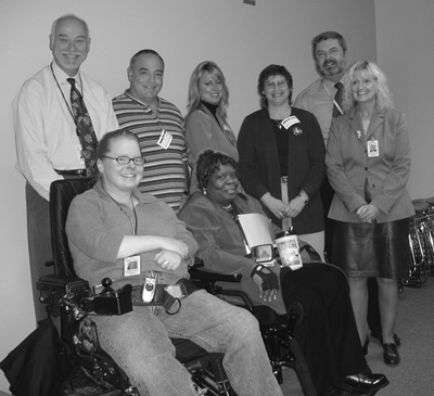 2006 teachers and mentors at the Federal Aviation Administration. Front row on the left is FAA employee and DO-IT '98 Scholar, Marissa. Group Picture of Teachers and Mentors.