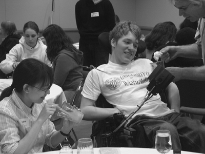 Students complete a science project at the AAAS luncheon. Picture of students with disabilities completing a science lab project