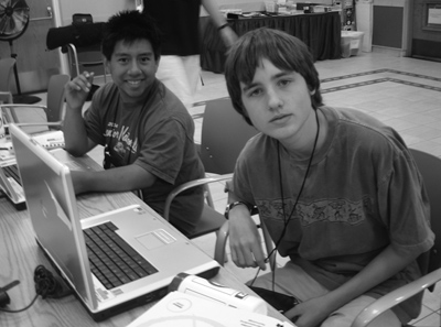 Picture of Phase I Scholars Oscar and Taylor using computers