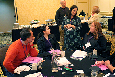 AccessComputing Program Coordinators Brianna and Kayla talk with participants about the event.