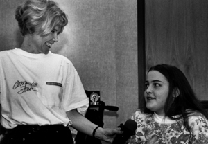 Director Sheryl Burgstahler interviews Phase III Scholar Jenny at a 1995 Computer Fair presentation Sheryl Burgstahler interviews Jenny
