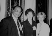 Dr. Roosevelt Carter of the NSF congratulates Kristin Otis and Sheryl Burgstahler after receiving the 1997 Presidential Award Picture of Sheryl Burghstahler, Kristin Otis, and Dr. Roosevelt Carter