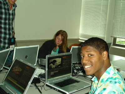 Phase II Scholar Amrit works on Green is the New Black, his film about environmentally-sound cars. Picture of Amrit working on a laptop.