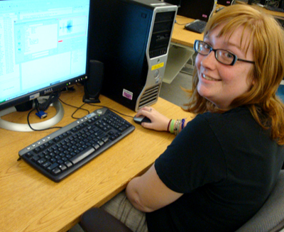 '09 Scholar Kristin participates in the UW's engineering lab. Picture of Kristin at a computer.