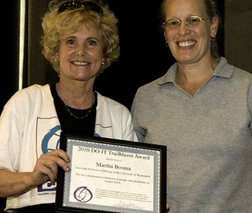 DO-IT Director Sheryl Burgstahler names Dr. Martha Bosma a Trailblazer. Picture of Sheryl and Dr Bosma with the Trailblazer Award.