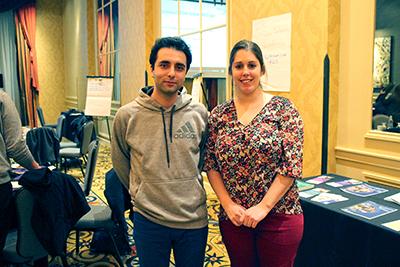 Two participants from the same ERC smile at the camera.