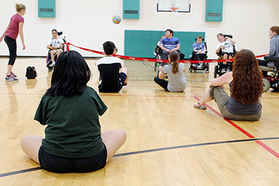 Students playing accessible sports. Students playing accessible sports.