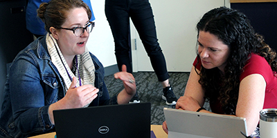 Two participants discuss accessibility.