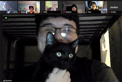 An NNL student shows off their cat over Zoom. An NNL student shows off their cat over Zoom.