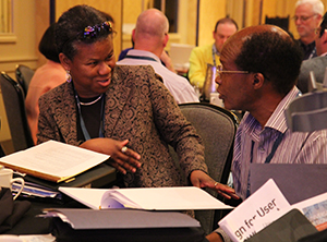 Two participants discussing engineering topics at the CBI.