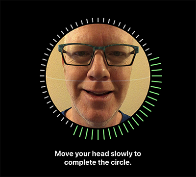 Terrill sets up FaceID; the text on the photo says, “move your head slowly to complete the circle.”