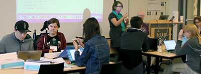 Students work on a coding project in a classroom.