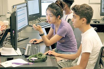 Students work together on a Quorum project. Students work together on a Quorum project.