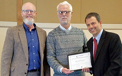 Terrill and Richard present the AccessComputing Capacity Award to Howard Kramer.