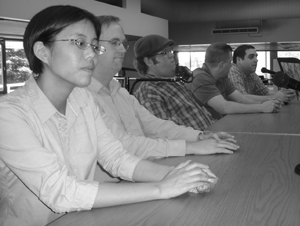 Image of employees with disabilities speaking on a career panel for high school students.