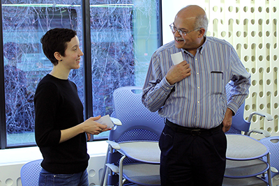 Two AccessERC CBI participants laugh together. Two AccessERC CBI participants laugh together.