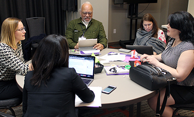 Participants discuss ideas.