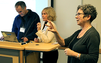 Sheryl Burgstahler presents while being translated.