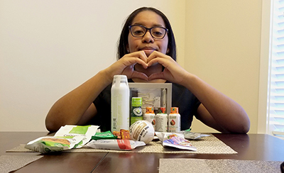 Ashlee shows off her goods from SnackMagic.