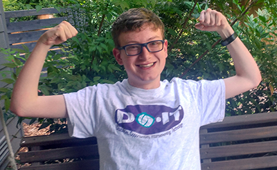 A Scholar shows off his DO-IT tee-shirt.