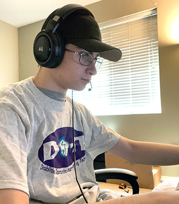 Cameron working on his computer.