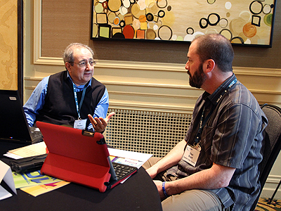 Image of two people collaborating at the 2014 AccessSTEM CBI
