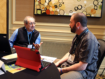 Two people collaborating at the 2014 AccessSTEM CBI Image of two people collaborating at the 2014 AccessSTEM CBI