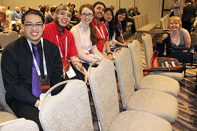 Students with Disabilities sit in a conference room.