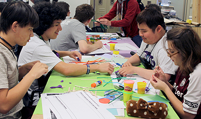 A group of Scholars work together on a design project during Summer Study 2016.