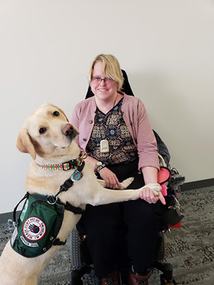 Brianna Vail and her service dog work together as a team; what makes a good service dog includes the strong bond between them.