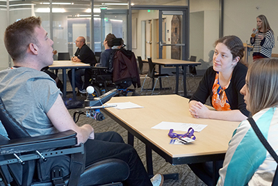 DO-IT participants works with a faculty member to improve their resumes.