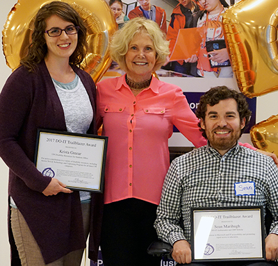 Sheryl Burgstahler congratulates Trailblazer recipients Krista and Sean at DO-IT’s 25th anniversary party.