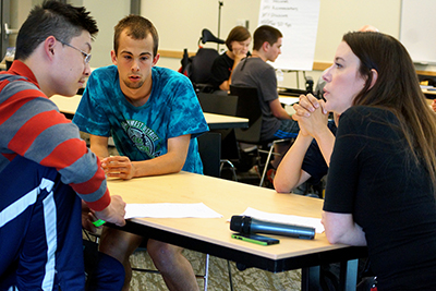 DO-IT staff help participants talk through transitioning to college.