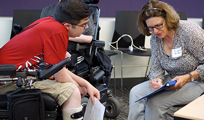 A DO-IT participant works with a faculty member to improve their resume.