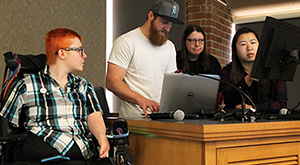 Presenters set up technology.