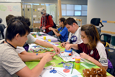 - Phase I Scholars Takashi, Jayda, Z, and Rochelle participate in a design challenge during Summer Study 2016. - Phase I Scholars Takashi, Jayda, Z, and Rochelle participate in a design challenge during Summer Study 2016.