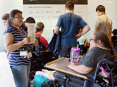 An educator shows a brain puzzle to a student.