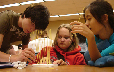 Photo of students working on an experiment.