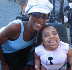 Photo of two students smiling for the camera.