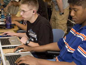 Students working on laptop computers. Photo of students working on laptop computers.