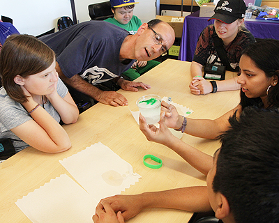 Image of students conducting an oceanography experiment.