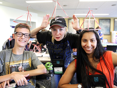 Image of students having fun making tetrahedron kites during Summer Study 