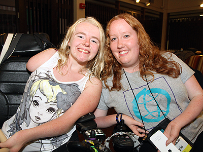 Image of two students posing during karaoke night