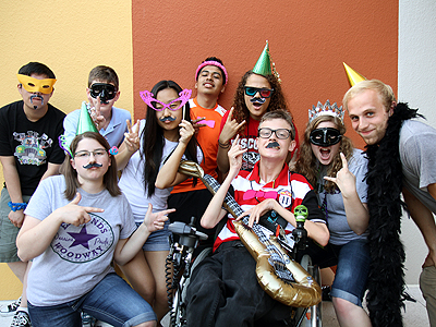 Group image of a students dressing up during craft night