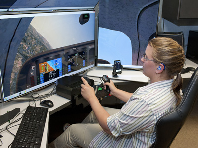 Student using a simulator Image of a student using a simluator