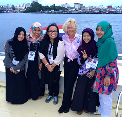 Sheryl Burgstahler stands with 5 other attendees of the First International Conference on Special Education in Bangkok.