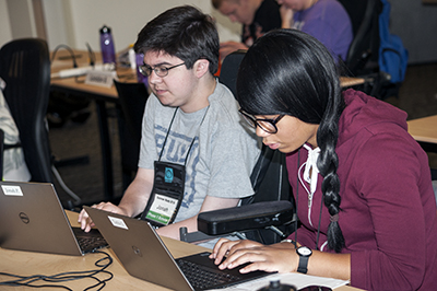 Phase I Scholars work on their computers.