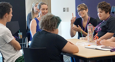 Students meet with faculty with an ASL interpreter.